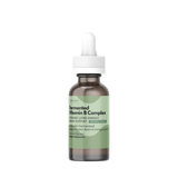 A small amber glass dropper bottle with a white cap and a pale green label, centered on a plain white background. The label text appears to read 'Soyfermented Vitamin B Complex'. – image 1